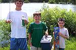 L/R   Charlie McCairns, Nicky Valerino and Hank Williams show their prizes for winning "The Most Fish" in their respective age category at the Ocean Pines Anglers Club Kids Fishing Tournament.
