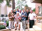 Members of Mt. St. Joseph alumni present at Bruggy party. Joe Reynolds, Class of '56, was oldest graduate in photo.
