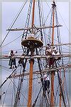 The crew of the Godspeed raises sail after being welcomed into Onancock Harbor on the Eastern Shore.