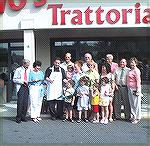 OP Chamber of Commerce assists owners Bob and Kelli Beck in cutting the ribbon for Denovo’s Trattoria in June 2005 following the opening of the restaurant in February.