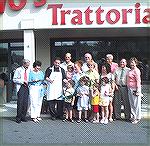 OP Chamber of Commerce assists owners Bob and Kelli Beck in cutting the ribbon for Denovo’s Trattoria in June 2005 following the opening of the restaurant in February.