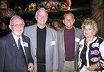 Folks at the Ocean Pines Area Chamber of Commerce Annual Dinner 2007. Ron Fisher (left) poses with Jan and Andrea Barnes and their son Jack.