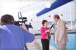Image from Grand Opening of the Ocean Pines Sports Core indoor pool enclosure on 10/13/2007. Deserie Lawrence interviews Marvin Steen.