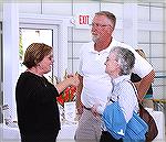 Image from Grand Opening of the Ocean Pines Sports Core indoor pool enclosure on 10/13/2007. Recs & Parks Director Mike Howell chats with some attendees.