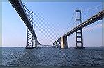 Crossing under the Bay Bridge as seen by OPA residents Dr. John Bower and Jack Barnes from deck of chartered Hunter 44.