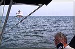 The Thomas Point Lighthouse, marking the entrance to the South River, as seen over the shoulder of Ocean Pines resident Dr John Bower. Jack Barnes and Dr Bower were on a chartered sailing trip with 3 