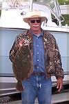 Chuck Choate shows off his 24" Flounder that netted him 1st place in the Ocean Pines Anglers Club annual Flounder Frenzy Tournament.