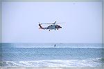 USCG demo'd a rescue using &quot;Rescue Randy&quot; (a dummy) and a real CG diver.  OC Air Show 6-11-08