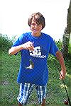 Chase shows off Big bluegill in Ocean Pines Anglers Club annual Kids Fishing Contest.