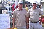 Bob Abele and Dick Nieman of Ocean Pines check out the Sea Bass pots at Harbor Day in W. Ocean City.