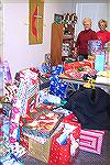 Marjorie Mause [L] and Lois Hoffman help organize the more than 200 gifts 
purchased by Community Church of Ocean Pines members that will be given to 
less fortunate children at Christmas as part of