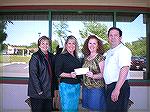 From Left to Right, pictured is Marie Gilmore  & Mary Eash, OP Skate Park Committee, accepting a $1,000 donation made by Kelli and Bob Beck, owners of Denovo’s Trattoria in Ocean Pines, to the Ocean P