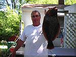Bill Walsh proudly shows off his 26&quot; Flounder that was the winning fish in the Ocean Pines Anglers Club/Maryland Saltwater Sportfishermens 2009 Flounder Frenzy tournament.