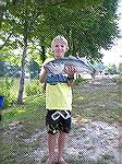 Christen Bruder shows off his 20&quot; large mouth bass, pulled form the south pond that took top spot in the 9-11 age group at the Ocean Pines Anglers Club 13th annual Art Hansen Memorial Youth Fishi