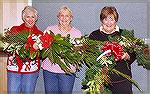 Ocean Pines Garden Club members show off some of the many wreaths and swags created during the annual &quot;Decorate the Pines&quot; event (12/1/09).