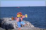 Sent on a trip to the ocean by 9 year old Lauryn Hentz of Philadelphia, Grand niece of Ocean Pines residents Jack & Andrea Barnes, Flat Stanley is seen enjoying a visit to the inlet.
Flat Stanley was