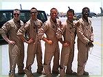 Lt. Col Jack Barnes III [3rd from left] and his KC-135 air refueling tanker crew as they returned to home base in Pittsburgh after missions in Afghanistan and Iraq. A diverse group of crewman in all s