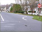 Carrollton Lane at intersection with Yacht Club Drive showing narrowing of road.