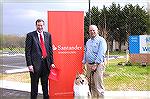 Therapy dog King is shown at Worcester County Developmental Center with Banco Santander Sr. Vice President William Sullivan and owner Jack Barnes. King won an award in a national contest sponsored by 