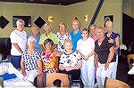 The Sisters of XI  Beta Epsilon Sorority hosted their Sister Jeanne Leroy at a luncheon at the Marina Deck restaurant in Ocean Pines. Jeanne, seated at right in front row,  and her husband George, bot