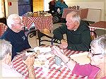 Ocean Pines trombonist Bill Courtney [R] visits with former Glen Miller and Stan Keaton clarinetist Wallace Kayne [L] at the Berlin Nursing Home. Bill, a professional muscian in his own right, heard a