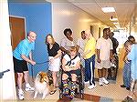 MaryAnn Carlson [holding leash] visits the Worcester County Developmental Center in Newark with her collie Zoe. The Center was one of the places that therapy dog King visited and they had not seen a c