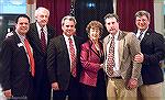 Chip Bertino (third from left) and Rick Handelman (second from right) were honored at the recent Ocean Pines Chamber of Commerce dinner at the Ocean Pines Yacht Club. Bertino's publication was honored