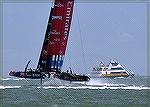 Americas Cup catamaran sailboat rises up on hydrafoils and hits 48 knots. 