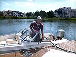 Jack Barnes fills up his boat at YC gas dock.
