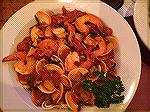 A terrific dinner at Denovos. Shrimp, steamed clams, and a great sauce over linguini. Yummy. 