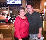 Marie Gilmore, outgoing president of the Worcester County Veterans Memorial at Ocean Pines, poses with Bob Beck, proprietor of Denovos restaurant during annual gathering to thank those who assist the 