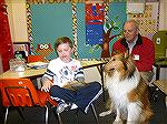 Tobi with owner Jack Barnes begins reading program at Showell Elementary with young Aidan Scott. Tobi is taking over for theapy dog King who passed away in June 2012.
