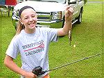 Young angler shows off her catch at Art Hansen Memorial 18th annual fishing contest.
