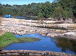 Photo in September of 2014 of progress in removing the Bishopville Dam. About halfway complete.