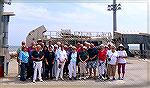 A group of Ocean Pines residents stand in front of Launch Pad 0A on Wallops Island.  This launch pad is used by the Antares rocket which sends supplies to the International Space Station.