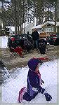 Neighbors on Harbormist Drive enjoy some bottled beer, wine and building snow forts after the February 2015 snowfall. Shown are Teresa Berger, Jenny, Matt & Greer Groves with Amelia Groves in the fore