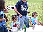 Melanie and Stacy register at OP Anglers Club Teach a Kid to Fish event.