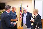 OPA Annual Meeting and board election. From left to right -- OPA GM Bob Thompson, newly elected board member Tom Herrick, OPA president Dave Stevens, and newly elected board member Cheryl Jacobs chat 