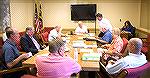 New OPA Board of Directors president Pat Renaud, seated at far end of table in white shirt, moments after his election as OPA president for the 2015-2016 year.
