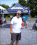 Forum member Doug Parks walks off with a trophy in the Ocean Pines Chamber of Commerce Classic Car Show.