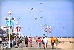 Looking north along Ocean City, Maryland boardwalk. Kites.