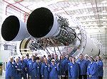 OPA tour group under the rocket engines.