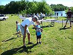 Angler Budd Heim instructs young angler Seamus from Berlin about casting.  The Ocean Pines Anglers Club hosted the annual Teach A Kid To Fish event on Saturday at the South Gate Pond. . Beautiful weat