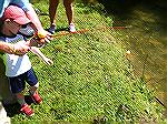 Young Angler Walker catches his first fish. 
The Ocean Pines Anglers Club hosted the annual Teach A Kid To Fish event on Saturday at the South Gate Pond. . Beautiful weather greeted Chairman Lee Phil