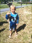 5 year old Luke Babato displays the first fish he has ever caught during the Ocean Pines Anglers Club Youth Fishing Contest