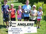
Winners of the Ocean Pines Anglers Club Youth Fishing Contest shown in photo are: L to R BIGGEST FISH; 12-16 Dyllan Arnold 9 1/2" Bass, 8-11 Noah Toadvine 15 7/8" Bass, 4-7 Savannah Ohrel 8" Bluegil