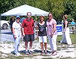 Ocean Pines Chamber of Commerce car show 8/29/2016.
Maryland Delegate Mary Beth Carozza (left) and OPA Marketing & Public Relations Director Teresa Travetello (right) post with a couple who won a tro