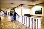 OPA Yacht Club customers will now be greeted just inside the main entrance door, thus allowing for a new bar / carryout food and beverage location (shown here) in the large entrance hallway. Another i