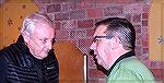 Jim Mathias (left) speaks with Bob Beck at Denovos on 12/07/2016 during appreciation night for Ocean Pines Veteran Memorial volunteers sponsored by Denovos.