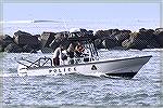 Boater who turned boat over on the OC South Jetty safe after rescue by DNR.